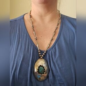 Vintage native turquoise handmade bead sterling silver necklace. Stamped MH whic